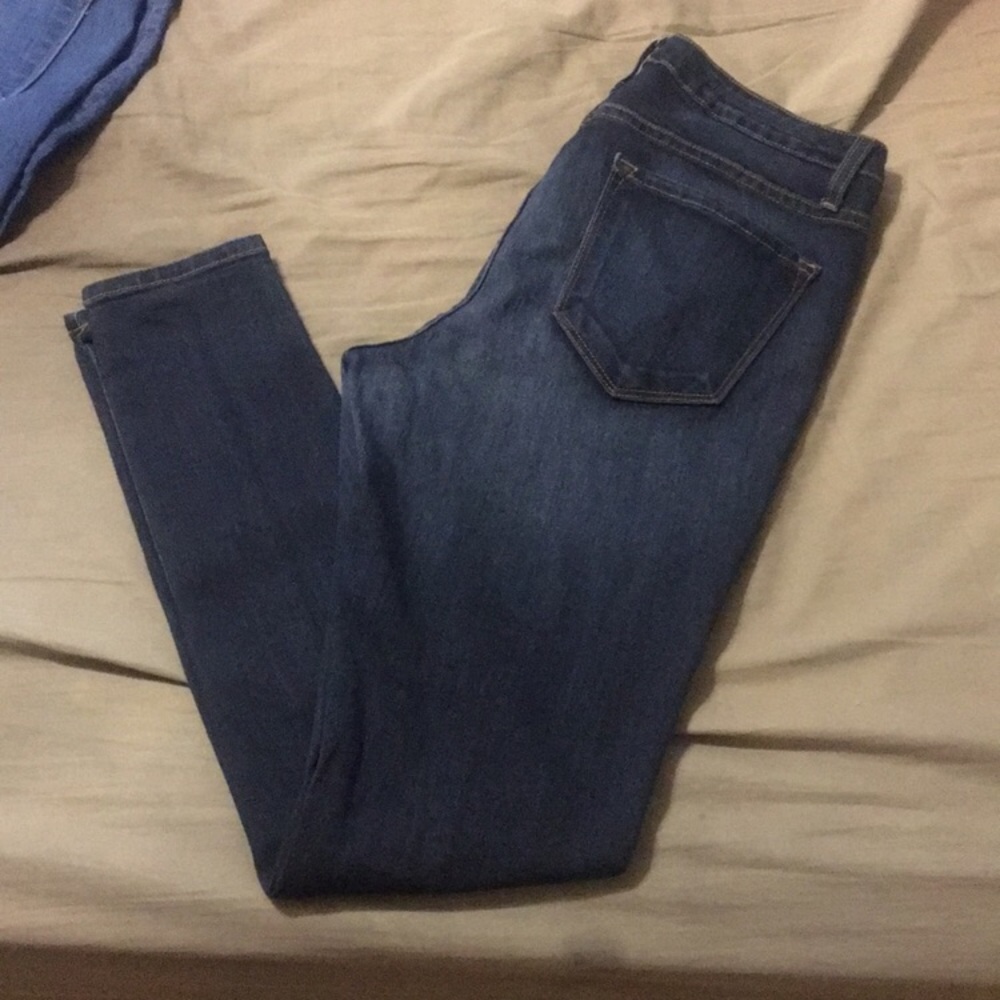 “Classic Mid Rise” skinny jeans